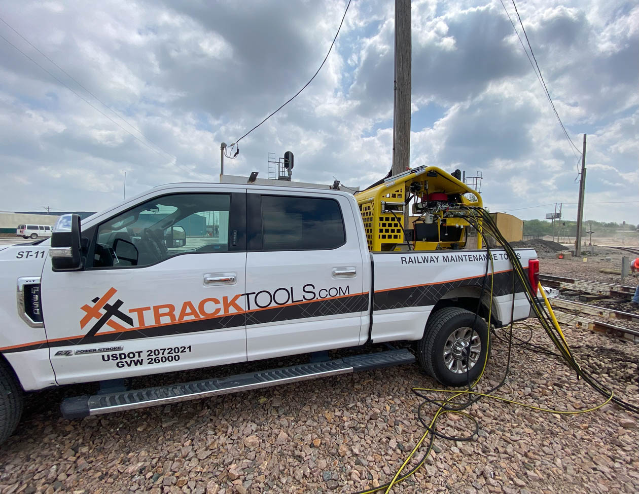 In a work zone with low clearance on overhead wires, the HydraSkid 248 was able to be operated conveniently from the bed off the pickup truck.