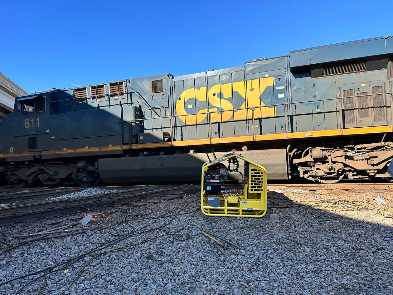 Lifting operation paused to let train pass through work area